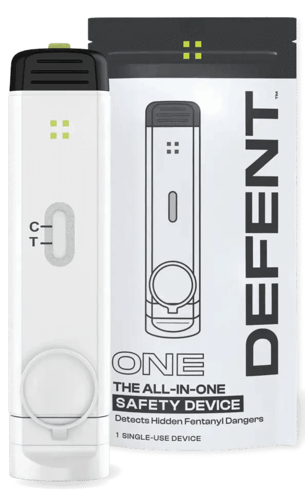 Person using DEFENT ONE fentanyl detection device to test a substance